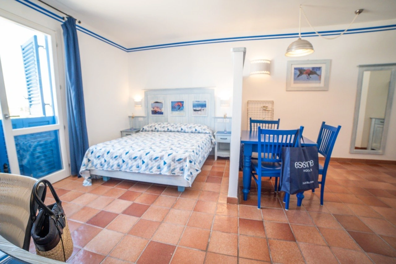Camera Superior con letto, divano e zona pranzo